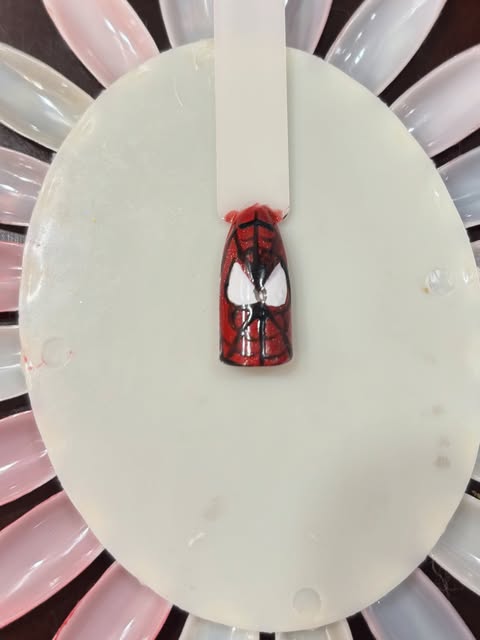 Hand-painted statement nail design